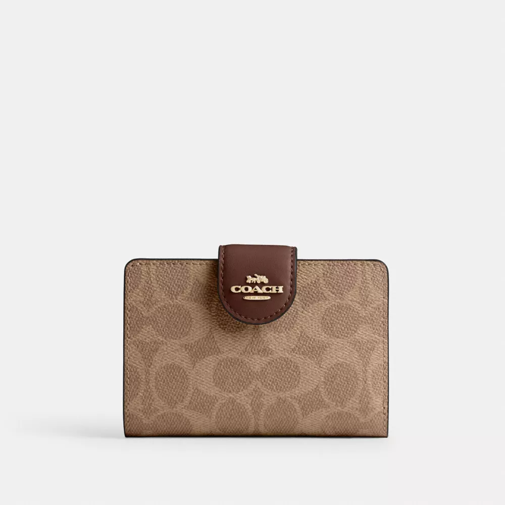 Coach mittelgroße Eck-Reißverschluss-Geldbörse aus Signature-Canvas